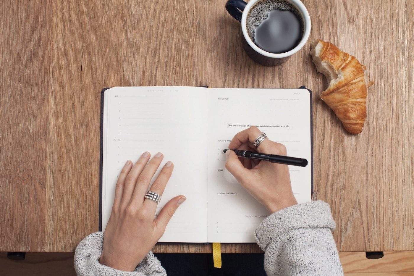 woman writing in a notebook